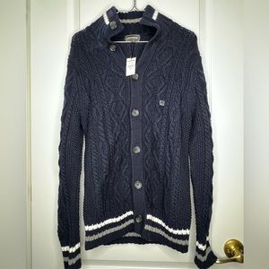 Men’s Express Cable-Knit Button-Up Cardigan Sweater in navy blue.